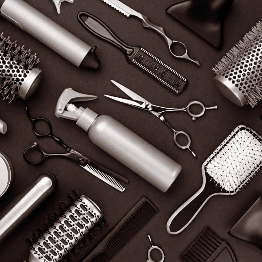 Professional hair styling tools flat lay